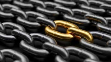 A sophisticated close-up of a single gold link within a black chain, symbolizing how the ACE Distribution Method™ bridges the gap between passive distribution and active sales performance.