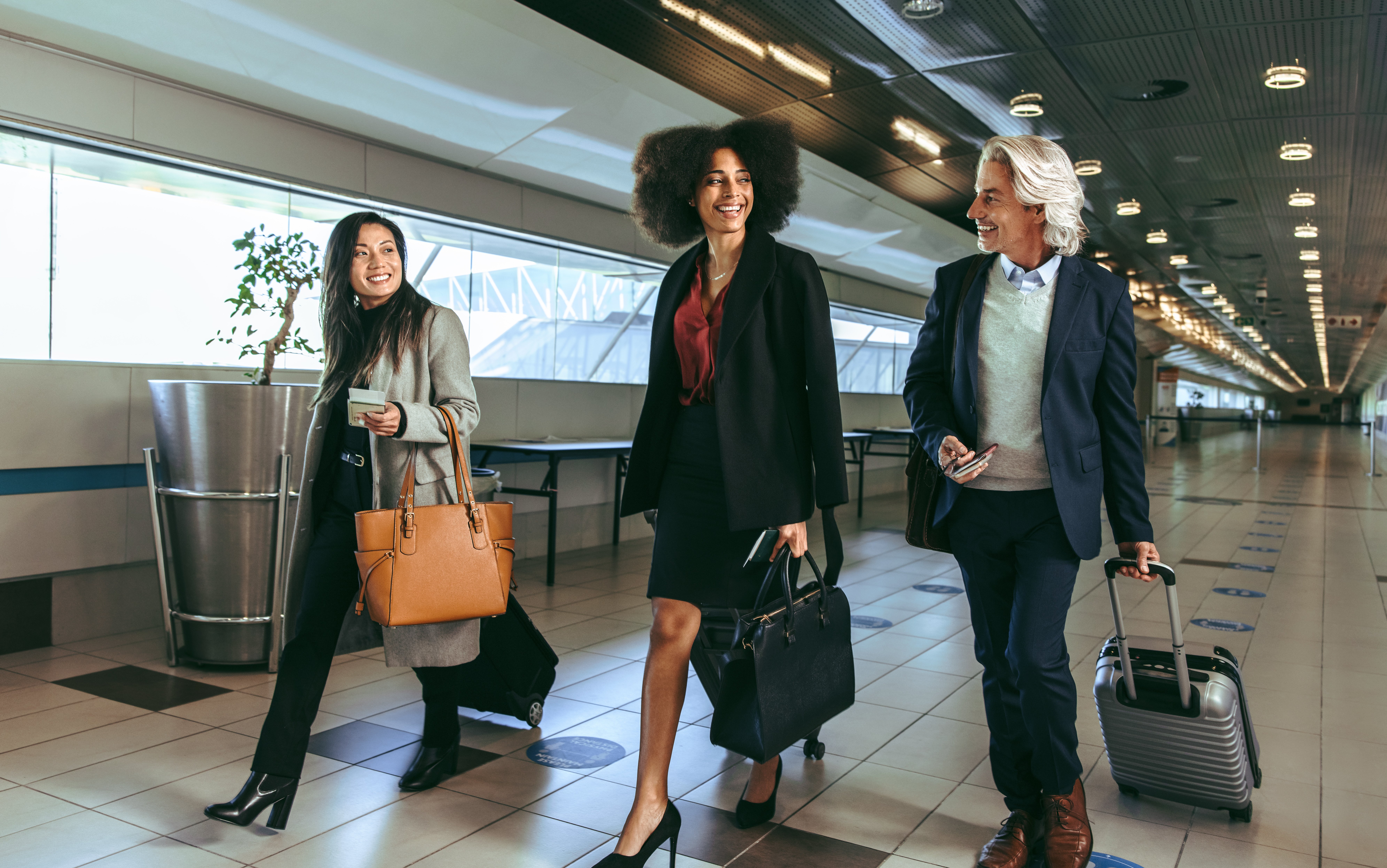 Diverse group of professional business travelers representing the high-value Consortia and TMC revenue captured through the Atypical Forte ACE Distribution Method.